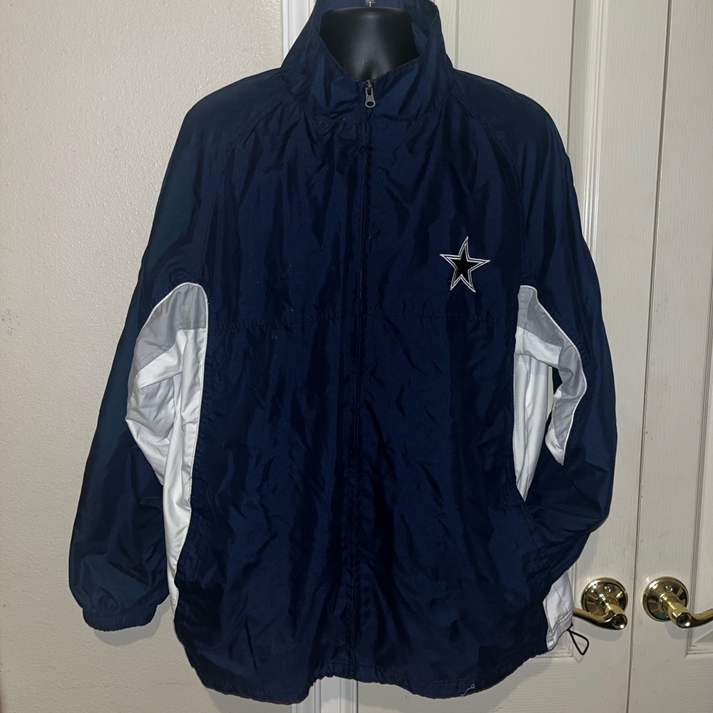 Dallas Cowboys Windbreaker / Rain Jacket . With adjustable waist. Front pockets.